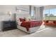 Spacious bedroom featuring neutral colors, large windows, and comfortable furniture at 8691 S Sicily Ct, Aurora, CO 80016