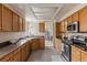 Functional kitchen with ample cabinet space and modern appliances at 11076 W Dumbarton Cir, Littleton, CO 80127