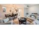 Open concept living space with a dining area and comfortable seating at 1350 Lawrence St # 2F, Denver, CO 80204