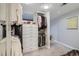 Organized walk-in closet with custom shelving and ample storage space at 1350 Lawrence St # 2F, Denver, CO 80204