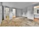 Spacious bedroom with carpet flooring, closet, and access to en-suite bathroom at 7058 S Madison Way, Centennial, CO 80122