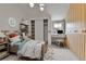 Bright, cozy bedroom with cute desk area, good lighting and storage space at 7058 S Madison Way, Centennial, CO 80122