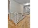 Bright hallway features carpet, wallpaper, and access to multiple rooms at 7058 S Madison Way, Centennial, CO 80122