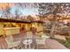 Elevated wooden deck offers a relaxing outdoor space with backyard views and outdoor seating at 5450 Mohawk Rd, Littleton, CO 80123