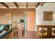 Welcoming foyer with brick flooring and views into the living area at 5450 Mohawk Rd, Littleton, CO 80123