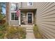 Inviting front entrance with porch and landscaping at 17036 Park Trail Dr, Monument, CO 80132