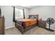 Comfortable bedroom featuring modern furnishings, natural light, and neutral decor at 9605 Orangewood Dr, Thornton, CO 80260