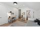 This bedroom features stylish decor, natural light and desk space at 332 S Franklin St, Denver, CO 80209