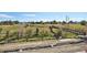 Aerial view of neighborhood with park and walking bridge at 1248 N Tennyson St, Denver, CO 80204