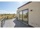 Private deck with sliding glass doors and city views at 1248 N Tennyson St, Denver, CO 80204