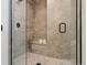 Spa-like shower with built-in seat and pebble floor at 1248 N Tennyson St, Denver, CO 80204