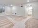 Expansive basement featuring neutral carpeting, a window for natural light, and an open layout at 17822 E 107Th Pl, Commerce City, CO 80022