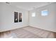 Bedroom with carpet features natural light from 3 windows at 17822 E 107Th Pl, Commerce City, CO 80022
