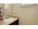 This bathroom features a sleek vanity with neutral countertops and a bright, clean ambiance at 10265 Olathe St, Commerce City, CO 80022