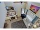 Aerial view of the open floor plan living room featuring high ceilings and natural light at 10265 Olathe St, Commerce City, CO 80022