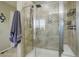 Close-up of the stand up shower with decorative tile work and modern fixtures at 10265 Olathe St, Commerce City, CO 80022