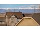 Picture-perfect view of the mountains behind the rooftops at 10265 Olathe St, Commerce City, CO 80022