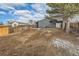 Backyard of home featuring wooden fence on a sunny day at 921 Meade St, Denver, CO 80204