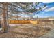 Expansive backyard featuring wooden fence on a sunny day at 921 Meade St, Denver, CO 80204