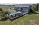 Aerial view of backyard featuring a deck, patio, play set, and shed at 2996 Savage Rd, Elizabeth, CO 80107