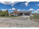 Exterior of a two-story home with a two-car garage and gravel driveway at 2996 Savage Rd, Elizabeth, CO 80107