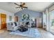 Bright living room featuring vaulted ceiling, comfortable seating and stylish decor at 2996 Savage Rd, Elizabeth, CO 80107
