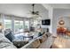 Spacious living area with deck access, seamless flow into the kitchen and dining area at 2996 Savage Rd, Elizabeth, CO 80107