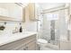 Clean bathroom featuring tiled shower, white vanity, and a modern design at 1292 W 133Rd Cir, Westminster, CO 80234