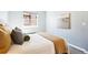 Bedroom with a neutral color scheme, window views, and stylish lamps at 1292 W 133Rd Cir, Westminster, CO 80234