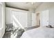 Bright bedroom featuring neutral paint, a large closet, and an ensuite bathroom at 1292 W 133Rd Cir, Westminster, CO 80234