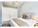 Bedroom with a neutral color scheme, window views, and stylish lamps at 1292 W 133Rd Cir, Westminster, CO 80234
