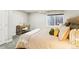 Cozy bedroom with a desk and soft, natural light, ideal for relaxation and work at 1292 W 133Rd Cir, Westminster, CO 80234