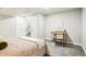 Comfortable bedroom featuring a carpeted floor, a desk and two entryways at 1292 W 133Rd Cir, Westminster, CO 80234