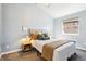 Bedroom with a neutral color scheme, window views, and stylish lamps at 1292 W 133Rd Cir, Westminster, CO 80234