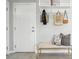 Welcoming entryway with bench, storage, and a bright, airy atmosphere at 1292 W 133Rd Cir, Westminster, CO 80234