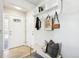 Welcoming entryway with bench, storage, and a bright, airy atmosphere at 1292 W 133Rd Cir, Westminster, CO 80234