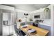 This remodeled kitchen offers stainless steel appliances, updated cabinetry, and a cozy breakfast bar at 1292 W 133Rd Cir, Westminster, CO 80234
