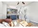 Cozy living area with a modern bar, open staircase, and stylish decor touches at 1292 W 133Rd Cir, Westminster, CO 80234