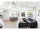 Airy living room features a cozy couch, modern furnishings, and great natural lighting at 1292 W 133Rd Cir, Westminster, CO 80234