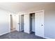 Bedroom with double door closet and built in shelving at 7780 Hollywood St, Commerce City, CO 80022