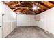 Unfinished garage with ample storage space at 7780 Hollywood St, Commerce City, CO 80022