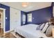 The primary bedroom offers ample space, natural light, and a big closet at 1655 S Lowell Blvd, Denver, CO 80219