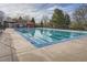 Outdoor swimming pool with clear water, perfect for a refreshing swim on a sunny day at 1655 S Lowell Blvd, Denver, CO 80219