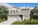 Charming two-story home with well-maintained landscaping and a two-car garage offers great curb appeal at 18961 E 96Th Pl, Commerce City, CO 80022