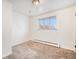 Simply styled bedroom with neutral walls and carpet at 4730 Carr St, Wheat Ridge, CO 80033