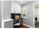 Functional built-in office space with natural light offers workspace and storage solutions at 16376 Stonefeld Pl, Parker, CO 80134