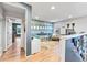 Spacious bonus room featuring creative decor, lots of natural light, and versatile open space for entertainment or hobbies at 17335 W 94Th Ave, Arvada, CO 80007