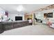 Spacious finished basement features carpeting, a fireplace and rec space at 10378 W Weaver Ave, Littleton, CO 80127