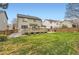 Lush backyard with a well-maintained lawn, great for entertaining at 9680 Burberry Way, Highlands Ranch, CO 80129