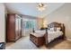 Cozy bedroom with natural light at 9680 Burberry Way, Highlands Ranch, CO 80129